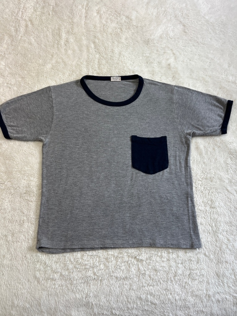 John Galt Gray Tee with Navy Trim and Pocket.